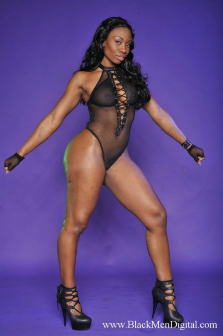 Ebony temptress La Starya with big booty poses in see-through black body suit