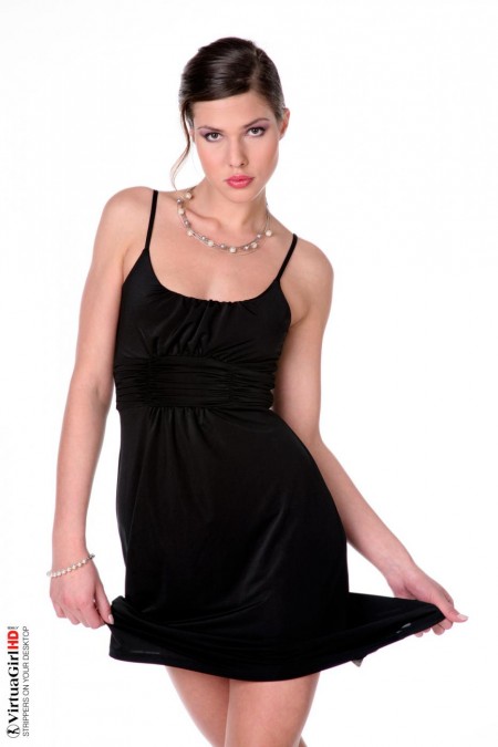 Lusty brunette model Olivia La Roche is wearing a cool black dress but not for long.