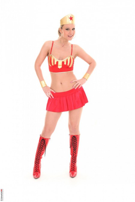Hot blonde Samantha Jolie loves red skirts but she prefers posing naked.