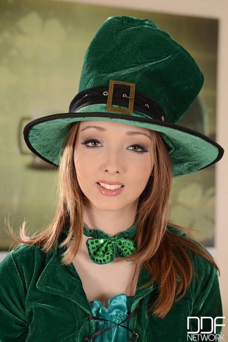 Adorable redhead with huge knockers Lucie Wilde poses in a sexy St. Patrick's Day uniform