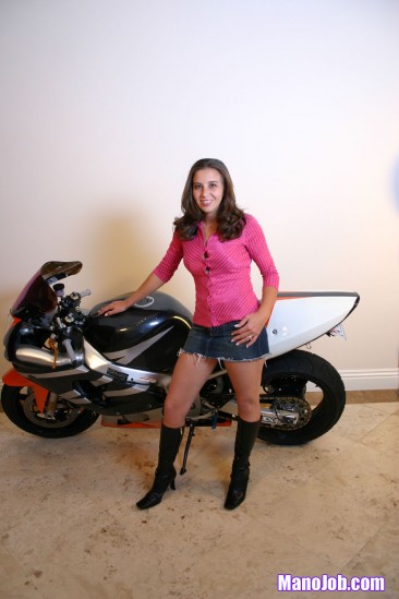Playful biker girl Kelly Kline teases a cock with her ass and tits then strokes it with her hands 